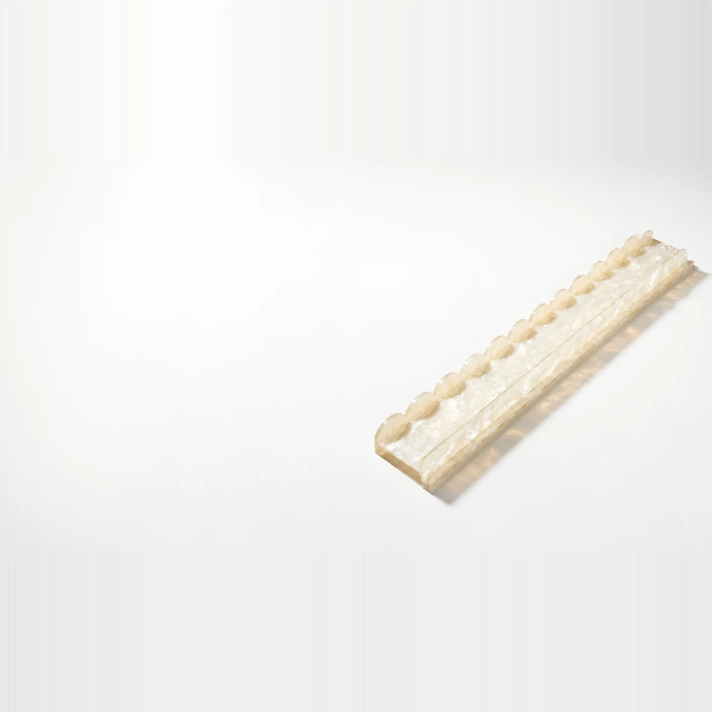 The Champagne Pearl Racks, Set of 4, four champagne pearl acrylic mahjong racks with marbled swirls